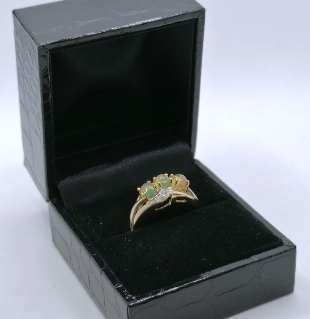 Ring Gold 375er mit Afrikanischen Opalen Gr. 60
