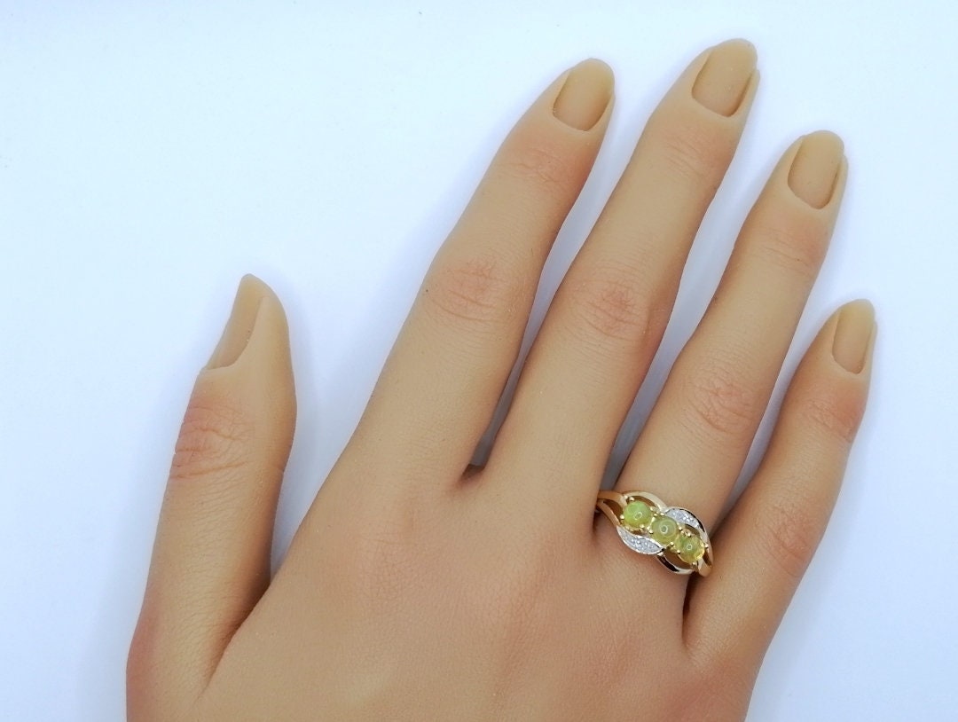 Ring Gold 375er mit Afrikanischen Opalen Gr. 60