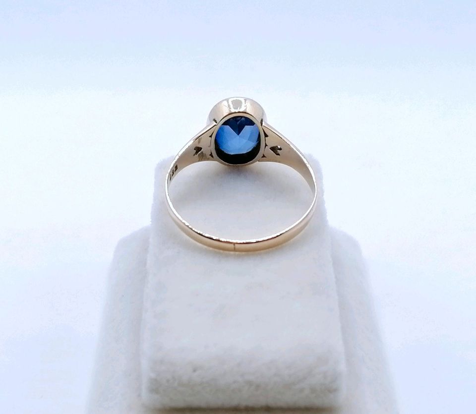 Ring Rotgold 333er mit Saphir