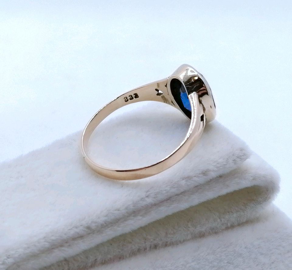 Ring Rotgold 333er mit Saphir